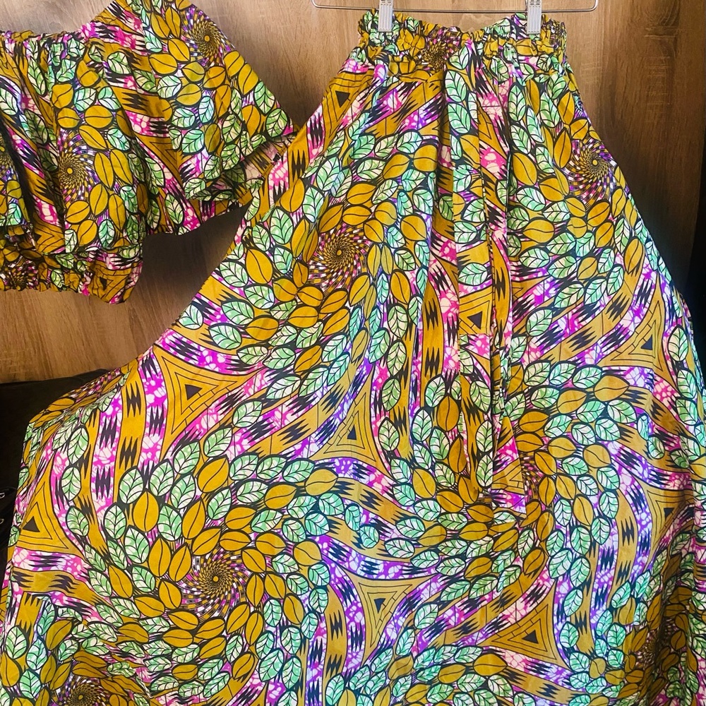 Two piece - top with long full skirt with two pockets. Ankara fabric.